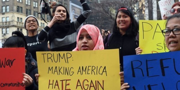 Protestors rally outside the Plaza Hotel on December 11, 2015 in New York, where Republican Presidential hopeful Donald Trump was speaking at a fund-raising luncheon for the Pennsylvania Republican Party. AFP PHOTO / TIMOTHY A. CLARY / AFP / TIMOTHY A. CLARY (Photo credit should read TIMOTHY A. CLARY/AFP/Getty Images)