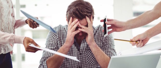 Businessman stressed out at work