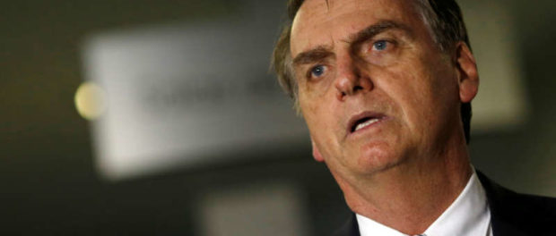 FILE PHOTO: Brazil's President-elect Jair Bolsonaro arrives to a meeting in Brasilia